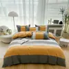 Nuevo juego de sábanas simple de cuatro piezas, funda de edredón, ropa de cama, funda de edredón de color liso, juego de tres piezas para cama de dormitorio de estudiante