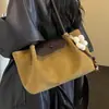 Bolso pequeño vintage de textura de alta calidad para mujer 2026 nuevo estilo moderno versátil de un solo hombro para llevar debajo del brazo bolso de mano para ir al trabajo
