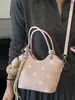 Bolsa de Axila de Lunares Estilo Francés para Mujer Shuai Mi Home Modelo Nuevo 2026 Bolso de Mano Bolso de Hombro Cruzado Simple y Elegante Bolsa de Viaje