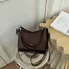 Bolso vintage de gran capacidad transfronterizo para mujer, nuevo bolso cruzado casual versátil de otoño 2026, bolso de hombro de lona para debajo del brazo
