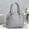 Nuevo bolso cruzado vintage con relieve de concha para mujer, bolso de mano moderno y versátil, bolso de hombro, bolso cruzado, bolso de nicho de moda