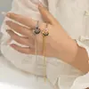 Colar com pingente de estrela e lua em aço inoxidável banhado a ouro 18K para mulheres, pulseira de titânio de luxo leve nicho, temperamento requintado de estrela e lua
