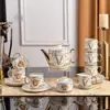 Juego de Café de Porcelana Ósea Medu Glaze Estilo Europeo Lujo Ligero Serie de Letras Taza y Platillo Occidentales Juego para el Té de la Tarde de 15 Piezas