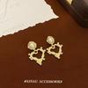 Escapa del corazón ~ pendientes de perlas de amor retro simples, diseño de nicho de moda, pendientes de personalidad Joker