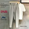 Pantalones profesionales para negocios, pantalones ajustados de moda estilo Hong Kong, ropa casual de hombre de alta gama sin planchado a la moda 2026