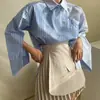 Camisa a rayas de color bloque vintage de alta gama de nicho para mujer de Dongdaemun, Corea, con un diseño único de botones diagonales