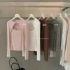 Y.JIA Moda Outono Estilo Puro Desejo Desconstruído Torcido Vazado Slim Fit Gola Redonda Manga Longa Camiseta para Mulheres 6927