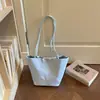 Bolso tote de nailon de nicho coreano para mujer, gran capacidad, nuevo modelo 2026, bolso cubo ligero para el día a día, bolso de hombro para mujer