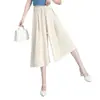 Calças cropped elegantes e fluidas de perna larga para mulheres, com um design inspirado na China, um visual jovial, cintura elástica com cordão e um efeito emagrecedor.