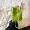 Bolsa Pequeña Transfronteriza al por Mayor para Mujer Primavera 2026, Bolso Cubo de PU Tejido a Mano a la Moda, Bolso de Hombro Cruzado