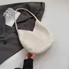 El popular bolso cubo de este año para mujer, gran capacidad, nuevo estilo primavera 2026, moderno, simple, textura tejida, de un solo hombro, bolso de axila