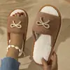 Novos chinelos de chão femininos de outono e inverno de alta qualidade, com laço transfronteiriço e sola macia, chinelos de algodão EVA da moda para uso doméstico