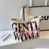 Bolsa Tote Gentil Mulher Grande Capacidade Feminina Chegada Nova Primavera 2026 Design de Nicho Bolsa de Mão Carta Bolsa de Ombro Único