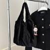 Bonito pelúcia cor sólida simples bolsa feminina 2023 outono e inverno estilo New Western grande capacidade commuter ombro axilar saco tote