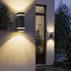 Lámpara de pared exterior doble cabezal luz hacia arriba y hacia abajo moderna simple impermeable semicírculo aluminio control de luz lámpara de inducción portalámparas E27