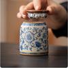 Pequeño Recipiente Sellado de Cerámica Portátil para Té con Diseño de Loto y Kiln Ru Azul y Blanco, Recipiente de Té Esmaltado de Alta Gama para el Hogar