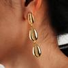 Nuevos aretes largos de concha de aleación populares de moda europea y americana para mujer, aretes de concha elegantes simples que combinan con todo