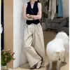 Atuendo de Verano 2026: Un conjunto completo de dos piezas para mujer que consta de un top tipo chaleco sin mangas con cuello tipo polo y pantalones casuales de pierna ancha