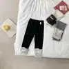 Leggings de primavera y otoño para niñas, ropa de bebé a la moda para bebés y niños, estilo coreano, bloques de color, letras, pantalones largos hasta el tobillo.