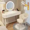 Nuevo modelo de tocador para dormitorio, mesa de maquillaje simple y moderna, gabinete de almacenamiento de lujo ligero, tocador pequeño estilo crema