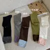 Calcetines largos estilo japonés Otoño/Invierno 2026, algodón, con bloques de color, color de contraste, estilo universitario, calcetines altos para mujer