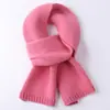 Bufanda de lana para niñas coreana de color liso bufanda pequeña otoño e invierno tejida bufanda para niños mayores Joker fábrica al por mayor