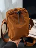 2025 Nuevo Estilo Japonés Otoño Bolsa para Teléfono con Cordón Simple Moda Viajero Exterior Casual Cruzada Bolso para Mujer