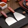 Pala de pizza de acero inoxidable al por mayor, pala para filetes, pala para freír, herramienta de mano para cocinar panqueques teppanyaki, pala para freír pasteles.