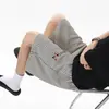 Bordado de Dachshund Listrado Rosa Shorts Casuais para Homens e Mulheres Verão 2025 Tendência Soltos para Casais ao Ar Livre Shorts de Cinco Pontos
