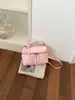 Bolsa Tote Pequena Super Moderna para Escritório Feminina 2026 Nova Primavera Popular Toque de Luxo Bolsa de Ombro Único Bolsa Balde Transversal para o Trabalho