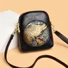Bolsa de ombro retrô estilo chinês da moda para mulheres, bolsa moderna para mães de meia-idade com múltiplos compartimentos, grande capacidade, bolsa transversal com relevo, moderna