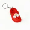 Llavero de Zapatos de Cueva Caliente Transfronterizos Mini Dibujo Animado Zapatitos Pequeños Llavero de Coche Colgante para Pareja Regalos Venta al por Mayor