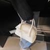 Bolso de mujer de primavera 2025, diseño de nicho de moda, informal, sencillo, pequeño, cuadrado, bolso de mano, bandolera de hombro.