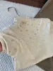 Top de punto estilo francés para mujer, con muchas perlas, cuello semi-alto y manga corta, perfecto para principios de otoño, con un diseño sofisticado y un aspecto único y hermoso