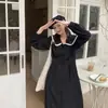 Vestido Preto Pequeno Estilo Hepburn para Mulheres 2026 Primavera e Outono Novo Vintage Decote V Longo Acima do Joelho Preto Elegante Vestido Saia Longa