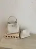 Bolso de mano de alta gama transfronterizo para mujer, nuevo bolso tipo cubo simple de moda, bolso cruzado y de hombro casual para el día a día, moderno