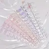 Venta al por mayor del fabricante Opcional multicolor 24 piezas Oval Ojo de Gato Hielo Transparente Uñas Portátiles Tiras para Manicura Ojo de Gato Transparente Hielo Sensible al Agua