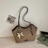 Bolso de mano de moda estilo coreano, fresco y simple, para mujer, debajo del brazo, nuevo bolso de hombro de moda de nicho para el verano 2026, bolso tote