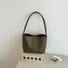 Bolso de axila texturizado vintage estilo francés para mujer, verano 2026 moderno casual tejido versátil elegante bolso de hombro