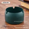 Sureste Asiático grueso anti-caída metal acero inoxidable cenicero ins alta gama tacto regalo cenicero venta al por mayor imprimir logo