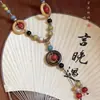 Collar largo con colgante de mariposa de cerámica de estilo étnico exótico, un accesorio de cadena para suéter bohemio y vintage para mujer
