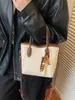 Bolso de Mano de Alta Gama Tipo Cubo para Mujer 2025 Otoño e Invierno Nuevo Bolso Tote Versátil Bolso de Hombro de Moda Bolso Cruzado Retro