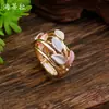 Anillo elástico geométrico hueco de esmalte con diseño de pétalo, muy vendido y de moda transfronteriza para mujer, anillo floral versátil simple y de alta gama