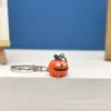 Nuevo producto transfronterizo: Llavero colgante de calabaza con ojos grandes divertido, decoración de bolsa de Halloween de calabaza, regalo promocional
