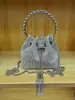 Bolso cubeta de diseño nicho con diamantes para mujer 2023 nueva moda bolso completo de diamantes dios del vino bolso de hombro cruzado para axila moda