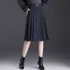 Moda y versátil falda de lana línea A para mujer, otoño 2026 nueva de cintura alta adelgazante elegante que reduce la edad falda de cuadros para mujer