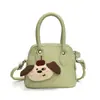 Bolso de Hombro para Niña Color Sólido Estilo Coreano Colgante de Cachorro de Dibujos Animados Bolso de Mano para Bebé Nuevo Mini Bolso Infantil
