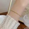 Collar de Cadena de Serpiente con Cuentas Redondas de Acero de Titanio de la Fábrica de Origen, Cadena Fina Minimalista Dorada para Mercados Europeos y Americanos Transfronterizos, Joyería de Cuello de Lujo Ligero de Alta Gama que Conserva el Color