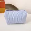25 Novas Sacolas de Cosméticos Listradas Mais Vendidas Transfronteiriças Indianas de Mão de Grande Capacidade Conveniente para Viagem Estojo