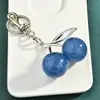 Venta Directa de Fábrica Personalizada Llavero de Cereza Colgante para Bolso Accesorios para Bolsos de Mujer Llavero de Coche Exquisito Venta Caliente Transfronteriza